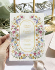 Invitație de nuntă florală pictată în acuarelă, cu design elegant și nume personalizate, perfectă pentru evenimente romantice – Diandra Events.
