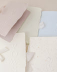 Carte jurăminte Vows pastel (roz, alb, verde, albastru) realizată manual pe hârtie artizanală handmade, colecție colorată Diandra Events